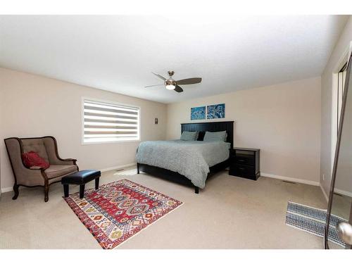 8 Auburn Springs Boulevard Se, Calgary, AB - Indoor Photo Showing Bedroom