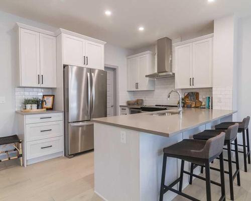 258 South Shore Court, Chestermere, AB - Indoor Photo Showing Kitchen With Stainless Steel Kitchen With Upgraded Kitchen