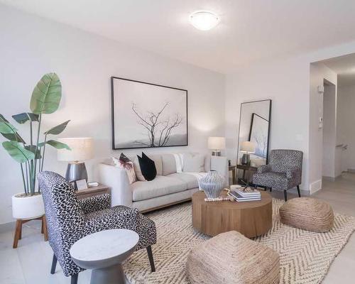 258 South Shore Court, Chestermere, AB - Indoor Photo Showing Living Room