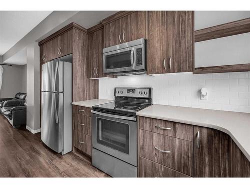 207 Nolanlake Villas Nw, Calgary, AB - Indoor Photo Showing Kitchen With Stainless Steel Kitchen