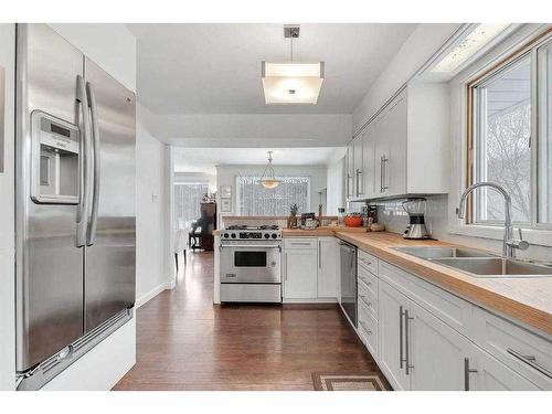 516 22 Avenue Nw, Calgary, AB - Indoor Photo Showing Kitchen With Double Sink