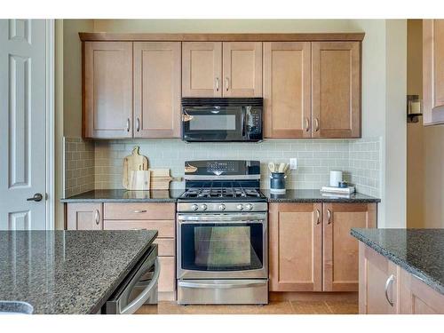 56 Windgate Close Sw, Airdrie, AB - Indoor Photo Showing Kitchen