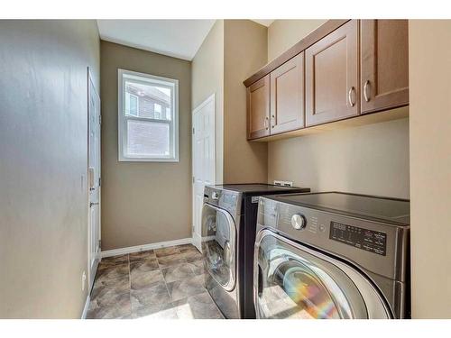56 Windgate Close Sw, Airdrie, AB - Indoor Photo Showing Laundry Room
