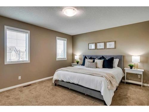56 Windgate Close Sw, Airdrie, AB - Indoor Photo Showing Bedroom