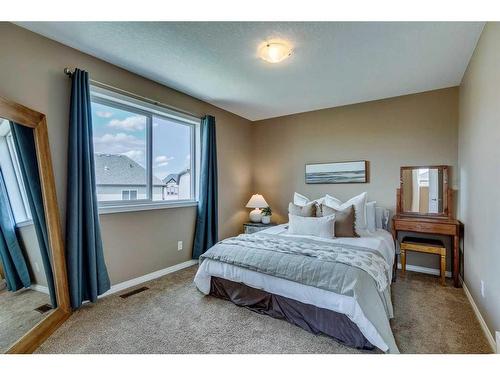 56 Windgate Close Sw, Airdrie, AB - Indoor Photo Showing Bedroom