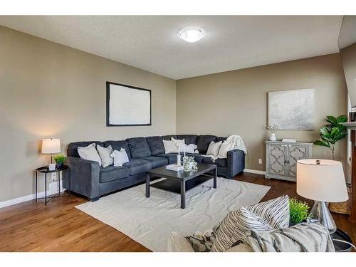 56 Windgate Close Sw, Airdrie, AB - Indoor Photo Showing Living Room