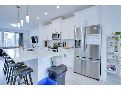 24 Evanscrest Place Nw, Calgary, AB - Indoor Photo Showing Kitchen With Stainless Steel Kitchen With Upgraded Kitchen