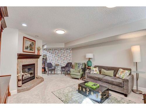 4208 16A Street Sw, Calgary, AB - Indoor Photo Showing Living Room With Fireplace