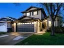 612 Meadowbrook Bay Se, Airdrie, AB  - Outdoor With Facade 