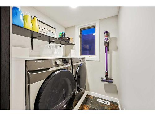 612 Meadowbrook Bay Se, Airdrie, AB - Indoor Photo Showing Laundry Room