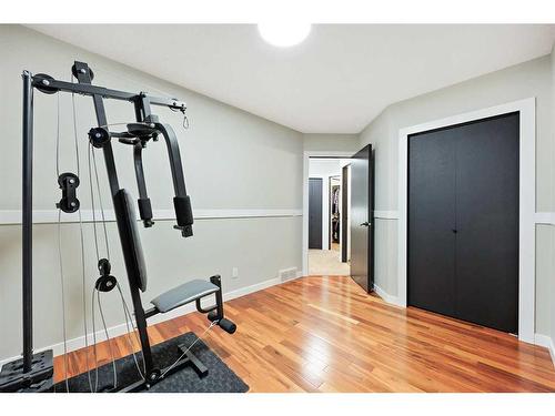 612 Meadowbrook Bay Se, Airdrie, AB - Indoor Photo Showing Gym Room