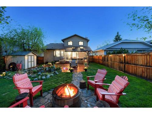 612 Meadowbrook Bay Se, Airdrie, AB - Outdoor With Backyard With Exterior