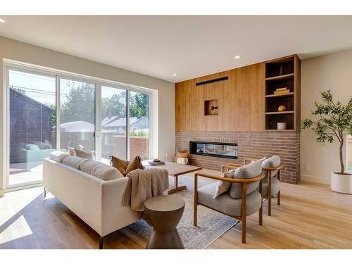 510 7 Street Ne, Calgary, AB - Indoor Photo Showing Living Room With Fireplace