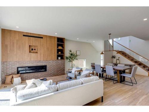 510 7 Street Ne, Calgary, AB - Indoor Photo Showing Other Room With Fireplace