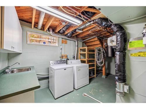 47 Rosetree Road Nw, Calgary, AB - Indoor Photo Showing Laundry Room