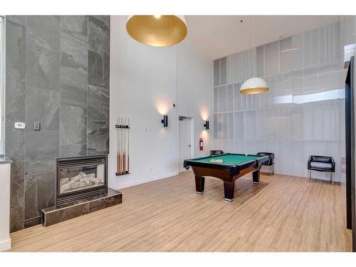 3004-210 15 Avenue Se, Calgary, AB - Indoor With Fireplace