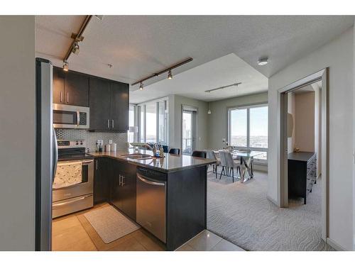 3004-210 15 Avenue Se, Calgary, AB - Indoor Photo Showing Kitchen With Stainless Steel Kitchen