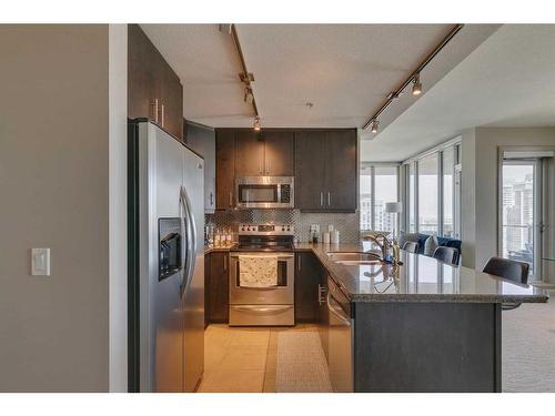 3004-210 15 Avenue Se, Calgary, AB - Indoor Photo Showing Kitchen With Stainless Steel Kitchen