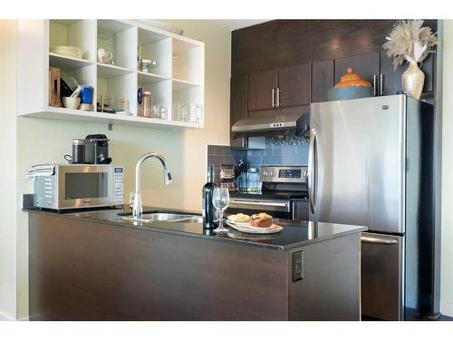 602-315 3 Street Se, Calgary, AB - Indoor Photo Showing Kitchen With Double Sink