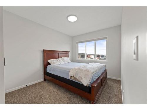 147 Dawson Harbour Hill, Chestermere, AB - Indoor Photo Showing Bedroom
