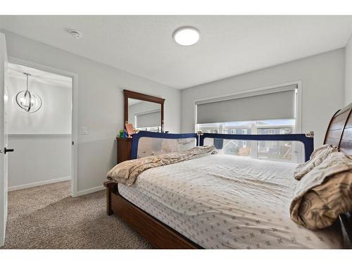 147 Dawson Harbour Hill, Chestermere, AB - Indoor Photo Showing Bedroom