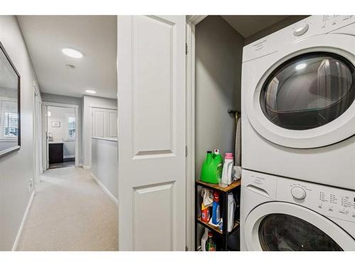 48 Legacy Mews, Calgary, AB - Indoor Photo Showing Laundry Room