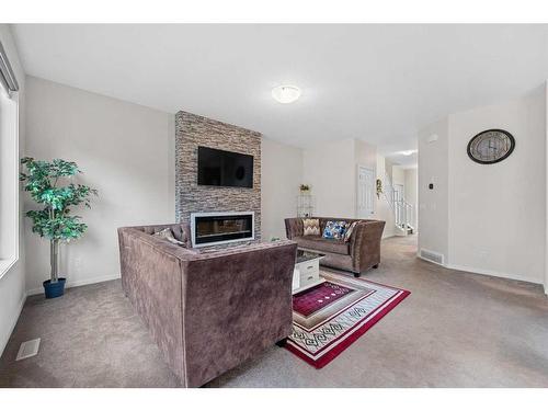 188 Cityspring Way Ne, Calgary, AB - Indoor Photo Showing Living Room With Fireplace