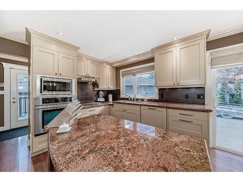 10 Lake Rosen Place Se, Calgary, AB - Indoor Photo Showing Kitchen With Double Sink