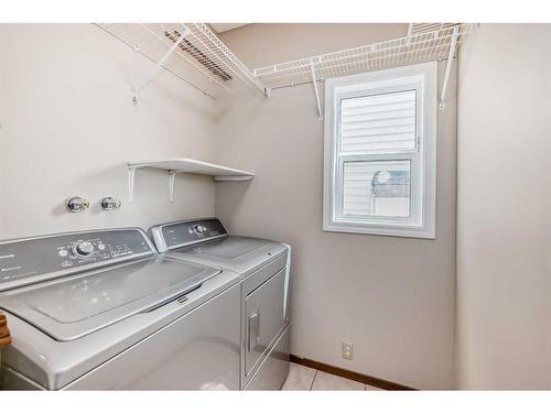 167 River Rock Crescent Se, Calgary, AB - Indoor Photo Showing Laundry Room