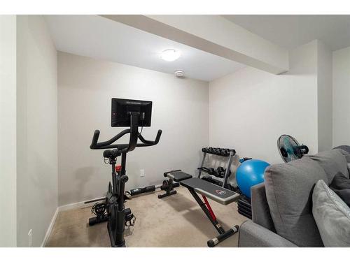 20 Evansborough Common Nw, Calgary, AB - Indoor Photo Showing Gym Room