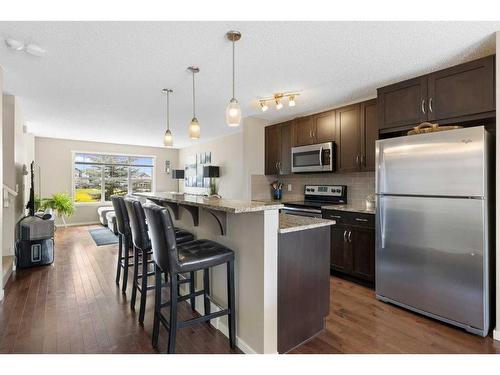 20 Evansborough Common Nw, Calgary, AB - Indoor Photo Showing Kitchen With Upgraded Kitchen