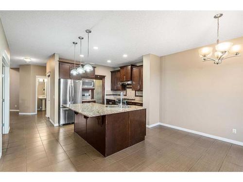 142 Silverado Bank Circle Sw, Calgary, AB - Indoor Photo Showing Kitchen With Upgraded Kitchen