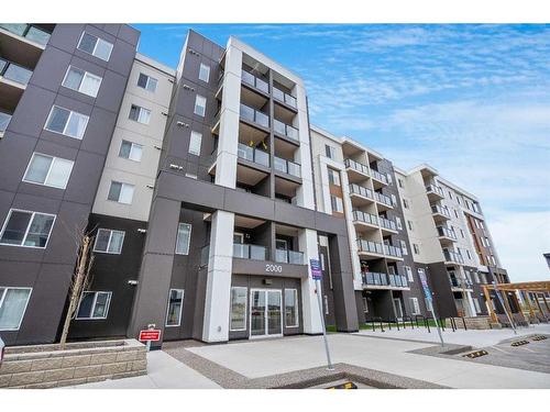 2215-4641 128 Avenue Ne, Calgary, AB - Outdoor With Balcony With Facade