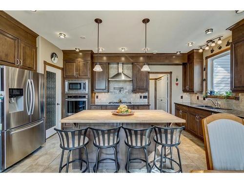 917 Sunhaven Way, Sunbreaker Cove, AB - Indoor Photo Showing Kitchen With Double Sink With Upgraded Kitchen