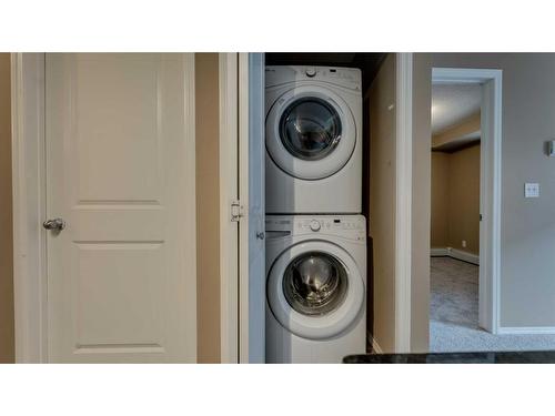 105-2715 12 Avenue Se, Calgary, AB - Indoor Photo Showing Laundry Room