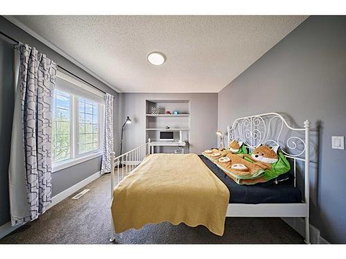 160 Strathridge Place West, Calgary, AB - Indoor Photo Showing Bedroom