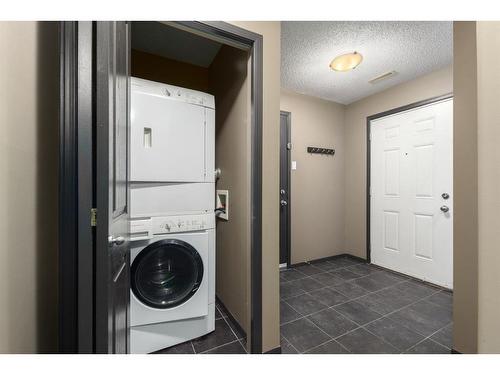 605 Country Village Cape Ne, Calgary, AB - Indoor Photo Showing Laundry Room
