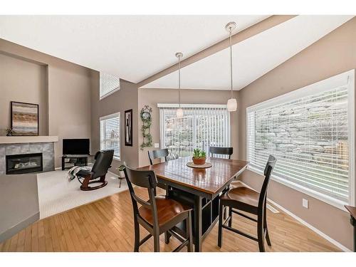 11923 Valley Ridge Drive Nw, Calgary, AB - Indoor Photo Showing Dining Room With Fireplace