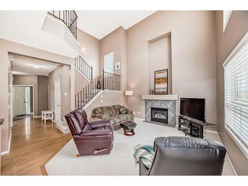 11923 Valley Ridge Drive Nw, Calgary, AB - Indoor Photo Showing Living Room With Fireplace