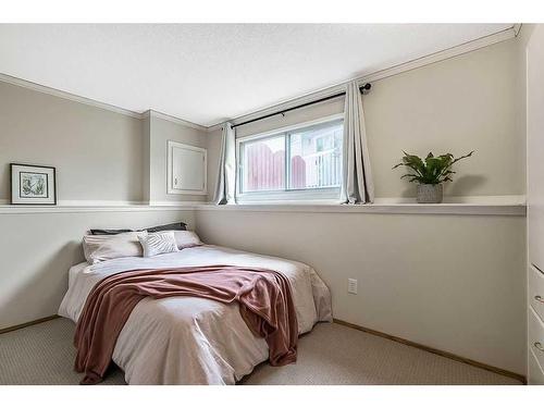 140 Sandarac Way Nw, Calgary, AB - Indoor Photo Showing Bedroom