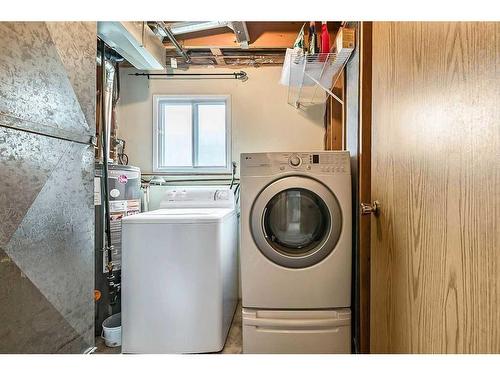 140 Sandarac Way Nw, Calgary, AB - Indoor Photo Showing Laundry Room