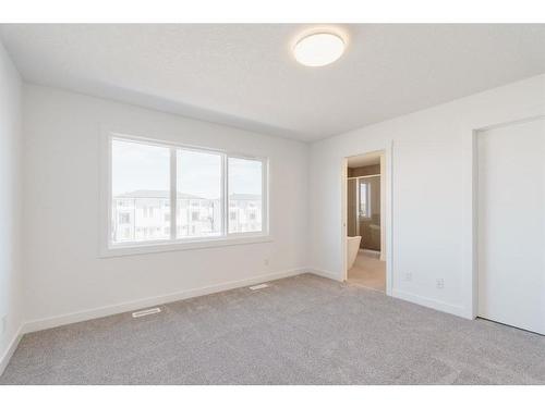 668 Creekstone Circle Sw, Calgary, AB - Indoor Photo Showing Other Room