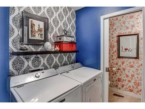163 Scenic Glen Place Nw, Calgary, AB - Indoor Photo Showing Laundry Room