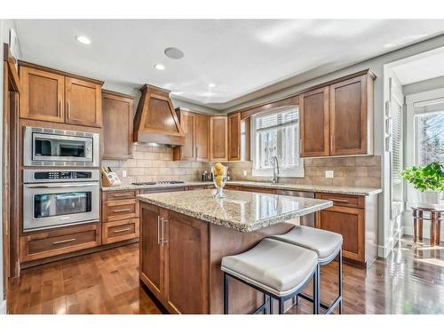 137 Rockcliff Bay Nw, Calgary, AB - Indoor Photo Showing Kitchen With Upgraded Kitchen