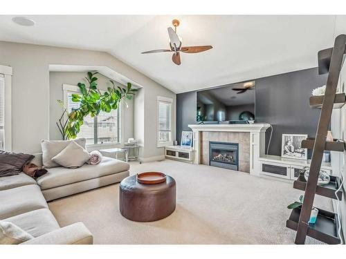 137 Rockcliff Bay Nw, Calgary, AB - Indoor Photo Showing Living Room With Fireplace