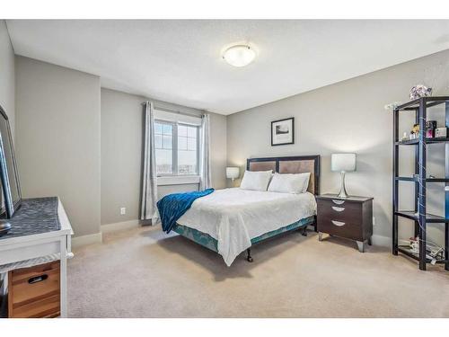 137 Rockcliff Bay Nw, Calgary, AB - Indoor Photo Showing Bedroom