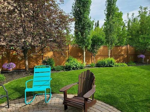 137 Rockcliff Bay Nw, Calgary, AB - Outdoor With Deck Patio Veranda With Backyard
