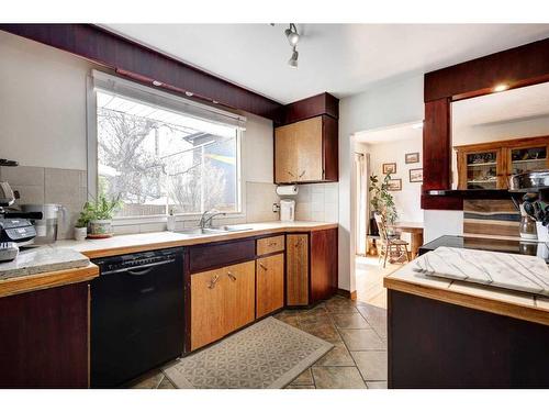 5011 Waverley Drive Sw, Calgary, AB - Indoor Photo Showing Kitchen With Double Sink