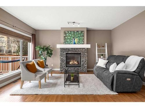 11751 Valley Ridge Boulevard Nw, Calgary, AB - Indoor Photo Showing Living Room With Fireplace