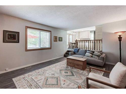 171 Riverbrook Way Se, Calgary, AB - Indoor Photo Showing Living Room